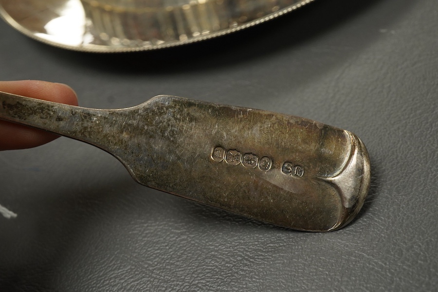 A Victorian silver side plate or stand, by John Edward Bingham (Walker & Hall), Sheffield, 1885, diameter 17.9cm, together with an early 20th century silver cream jug and sugar bowl by Barker Brothers and a Victorian pro